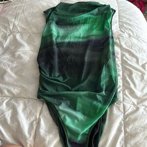 Black and various shades of green bodysuit